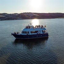 Plaukimas laivu Kuršių mariose iš Nidos